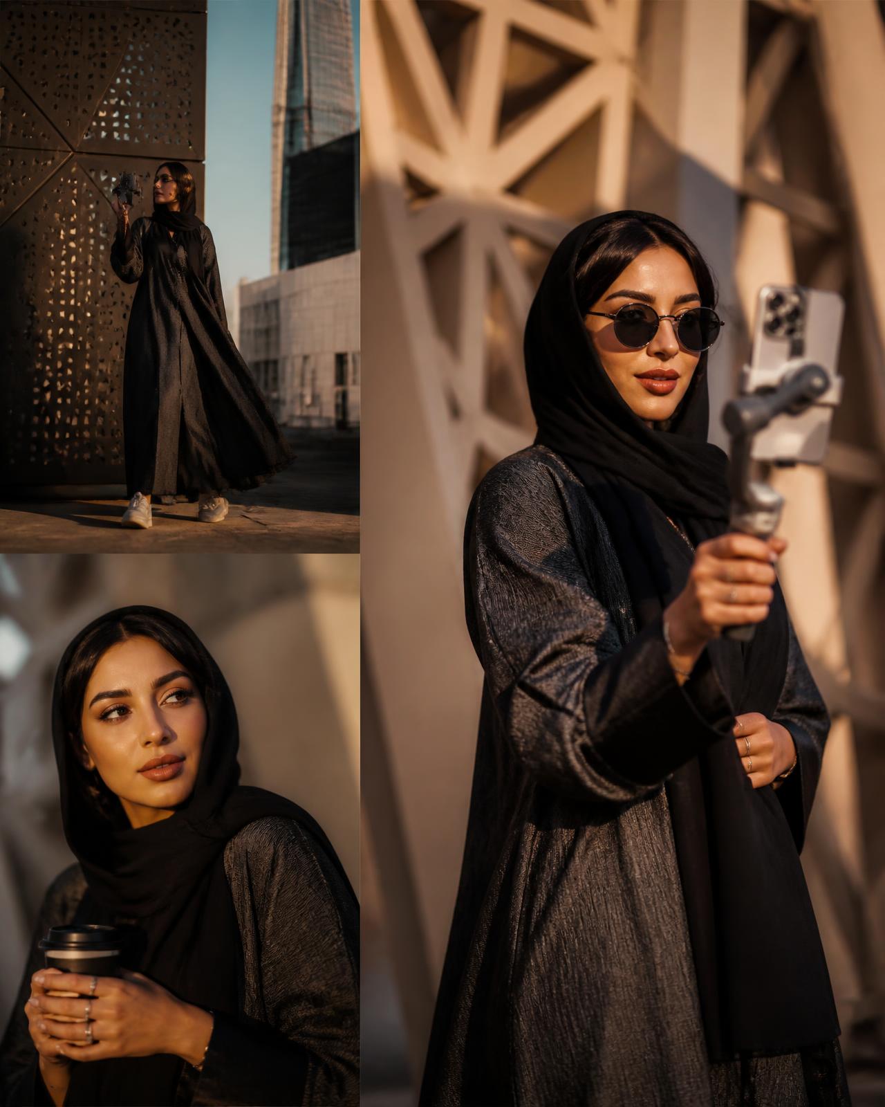 Gulf content creator filming vertical video on a gimbal in modern Riyadh architecture